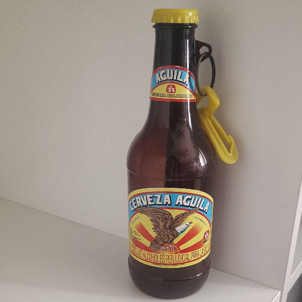 Cerveza Aguila Bottle with Yellow Opener